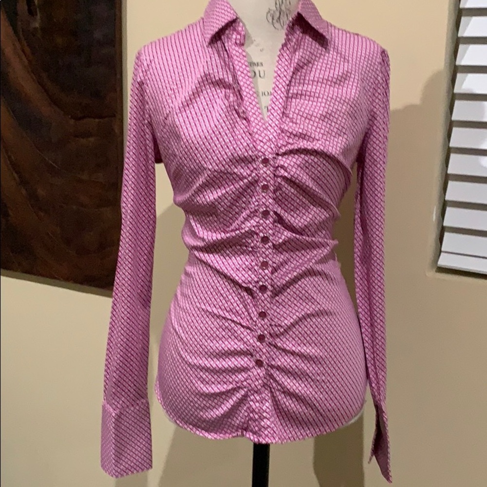 Pink shirt with black dots
